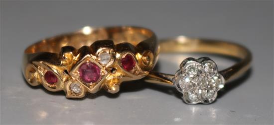 Two early 20th century 18ct gold gem set rings, including diamond cluster.